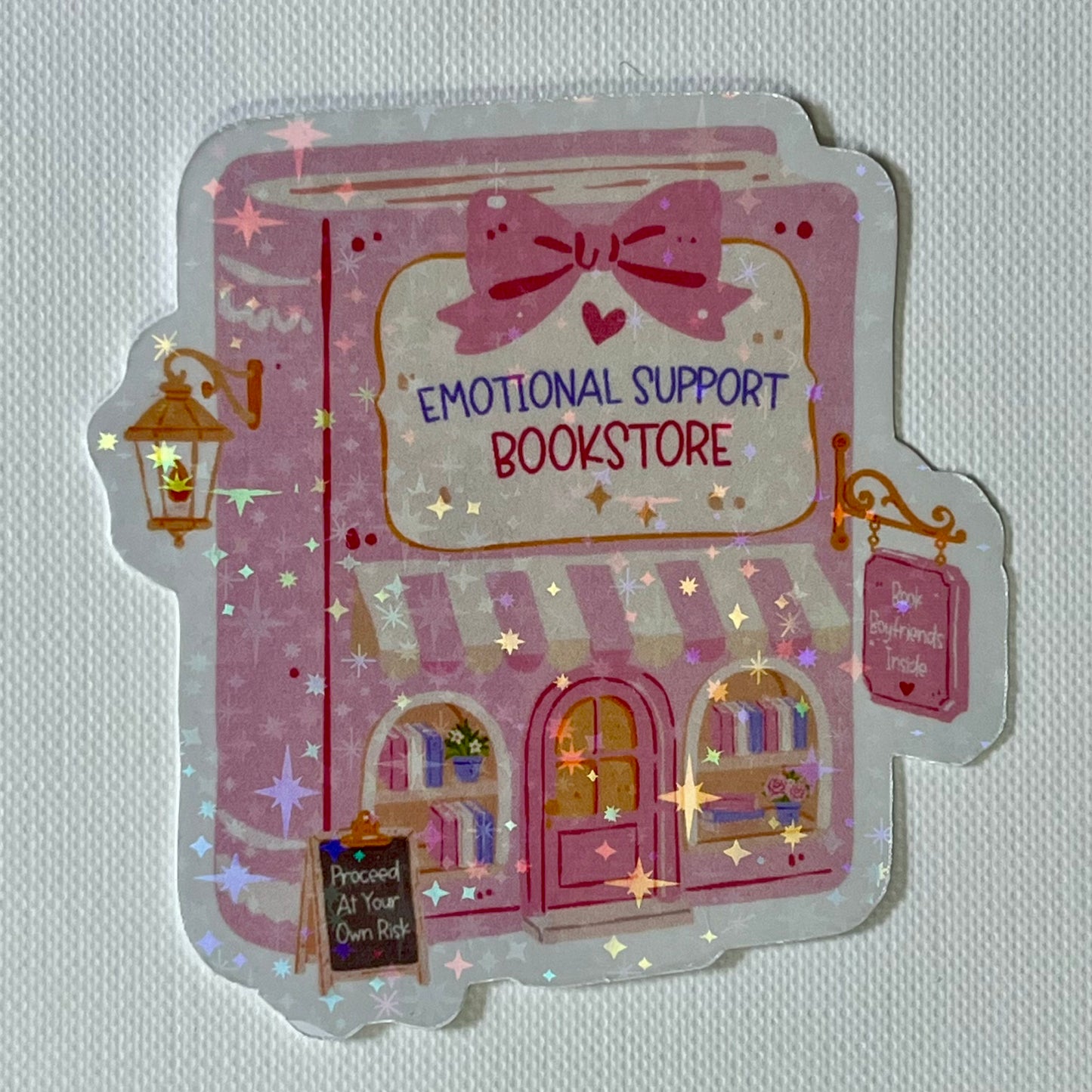 Naklejka Odklejka z serii DELULU - EMOTIONAL SUPPORT BOOKSTORE