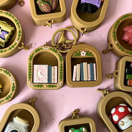 Mini biblioteczka – charms brelok fidget kliker dla miłośników książek